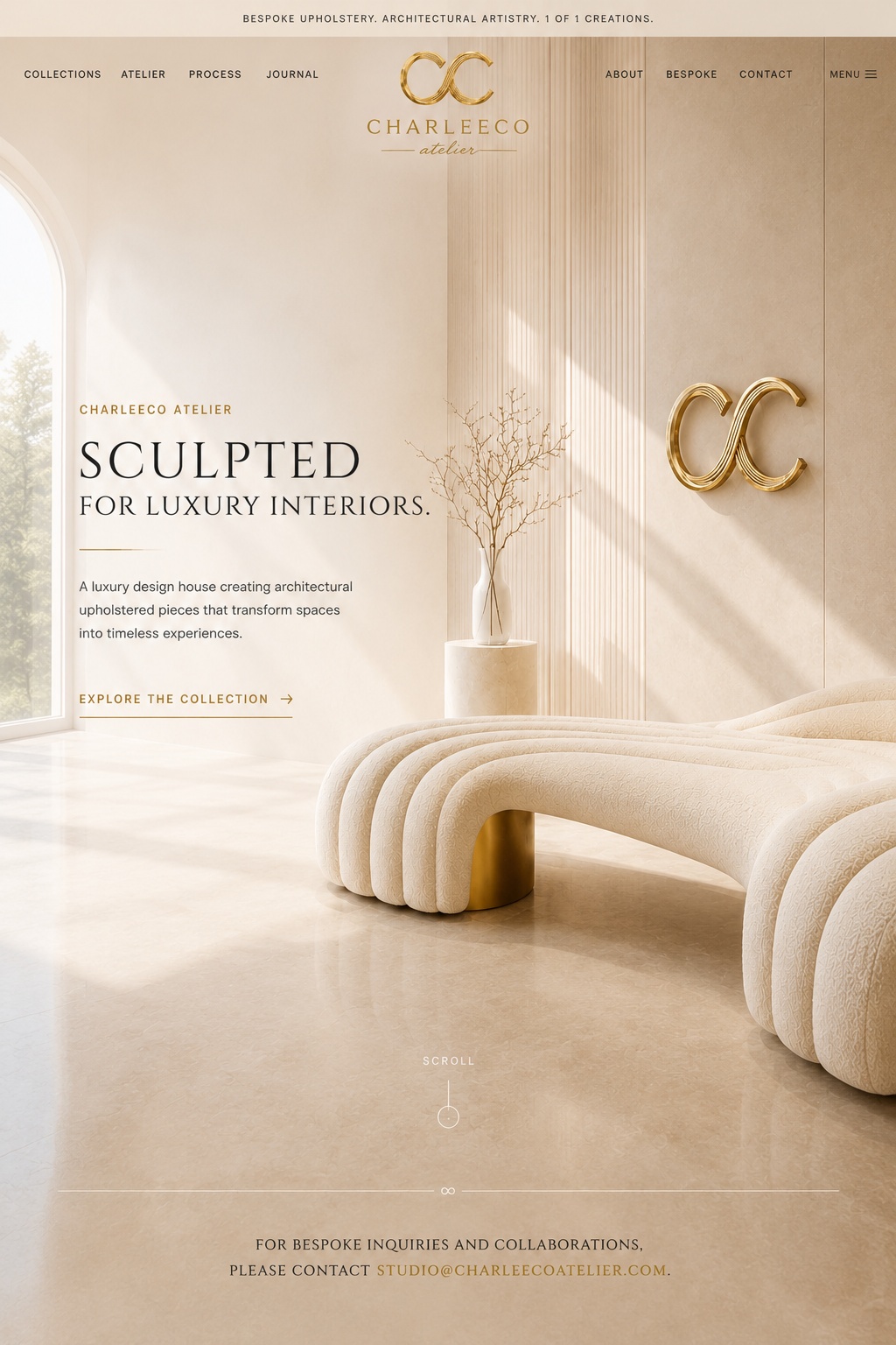 CharleeCo Atelier luxury room with sculptural bench and gold CC wall emblem